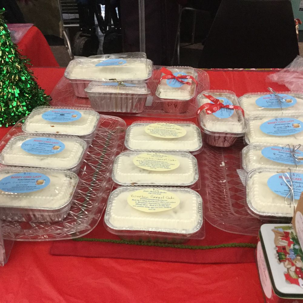 Frosted cakes packed and ready at Janet's festival table